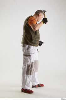 Agustin Wilkerson Carpenter Pose with Hammer standing whole body 0006.jpg